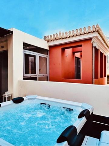 Property building, Patio, Day, Natural landscape, Hot Tub, Pool view, Swimming pool, sunbed