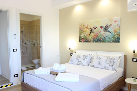 Bed, Bedroom, towels, wardrobe, air conditioner