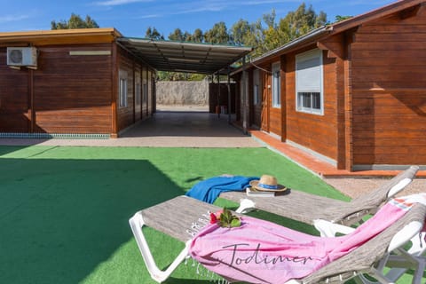 Property building, Patio, Garden, Pool view, Swimming pool, sunbed