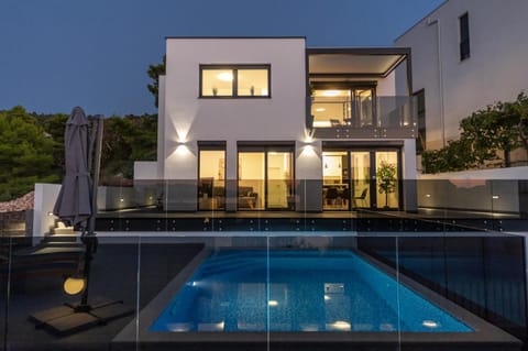 Property building, Patio, Night, Swimming pool