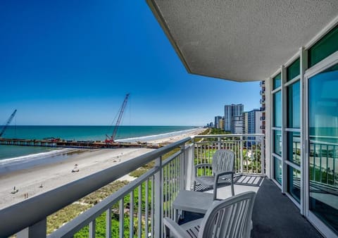 Property building, Patio, Day, Natural landscape, View (from property/room), Balcony/Terrace, Seating area, Beach, Sea view
