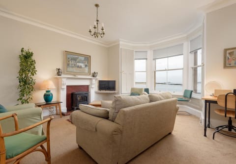 View (from property/room), Living room, Seating area, Sea view