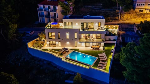 Property building, Night, Swimming pool