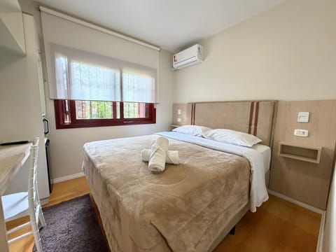 Bed, Photo of the whole room, Bedroom, towels, air conditioner