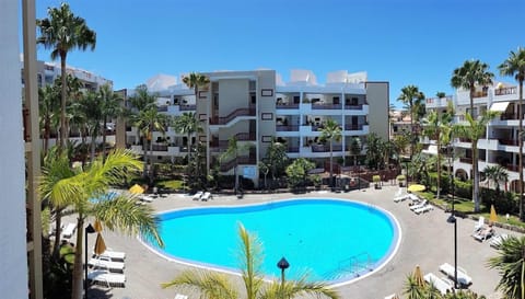 Property building, Living room, Swimming pool