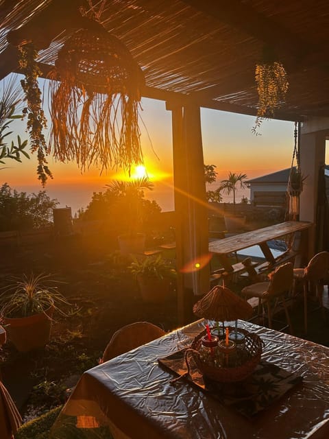 Natural landscape, View (from property/room), Dining area, Sea view, Sunset