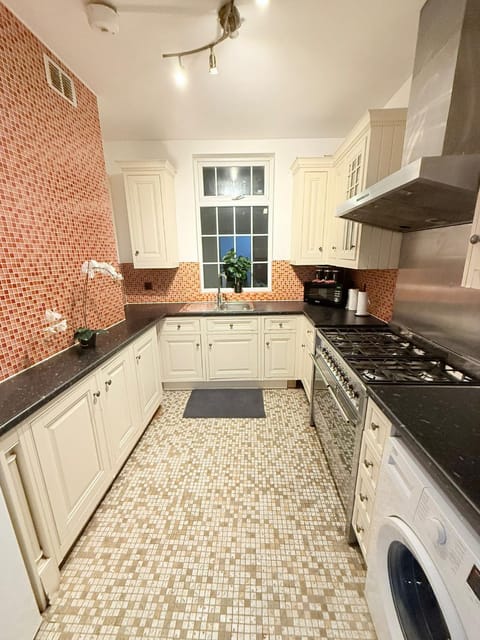 Kitchen or kitchenette, stove, toaster