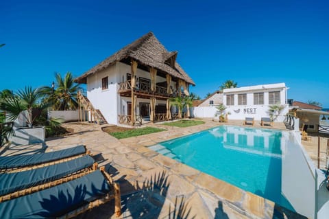 Property building, Swimming pool, Swimming pool, sunbed
