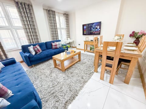 Property building, TV and multimedia, Living room, Decorative detail, Seating area, Dining area, flat iron, heating, internet, air conditioner