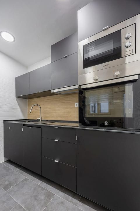 Kitchen or kitchenette, oven, stove