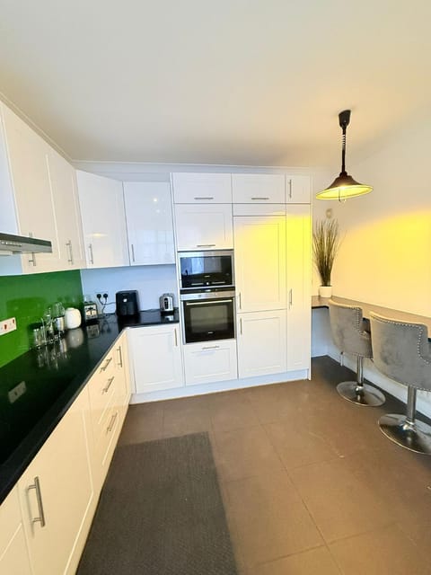 Kitchen or kitchenette, oven, stove, toaster