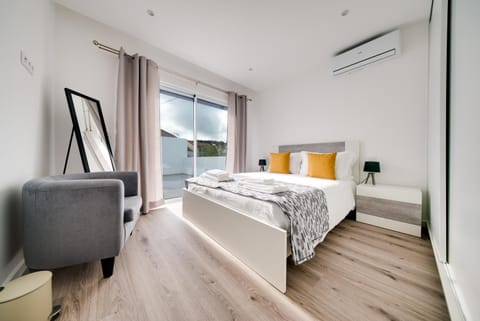 Bedroom, furniture, towels, air conditioner