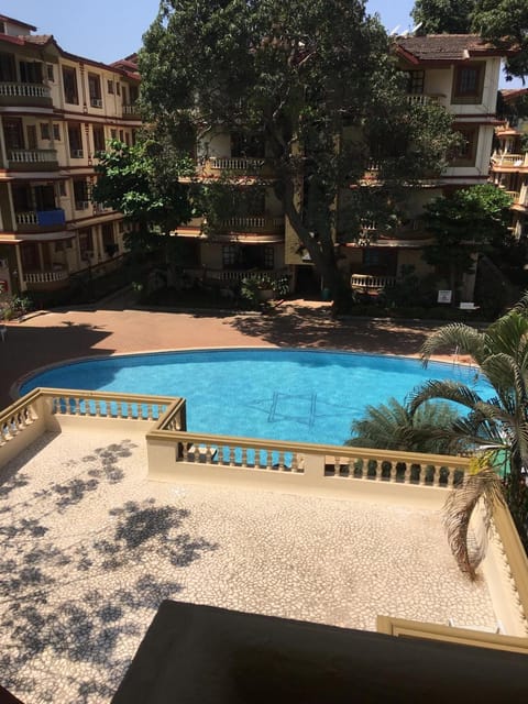 Property building, Patio, Day, View (from property/room), Balcony/Terrace, Pool view, Swimming pool, sunbed