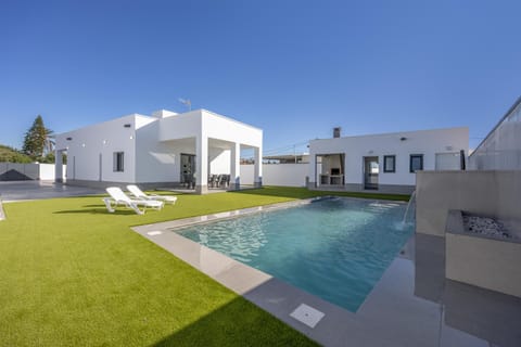 Property building, Living room, Swimming pool