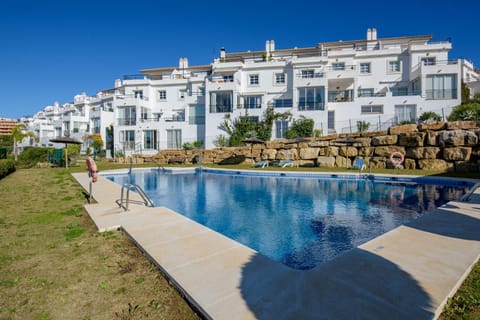 Property building, Living room, Swimming pool