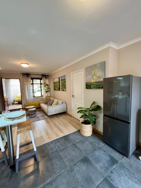 Serene 1 bedroom apartment-shared pool-Self cater-sleeps 2 Apartment in Cape Town
