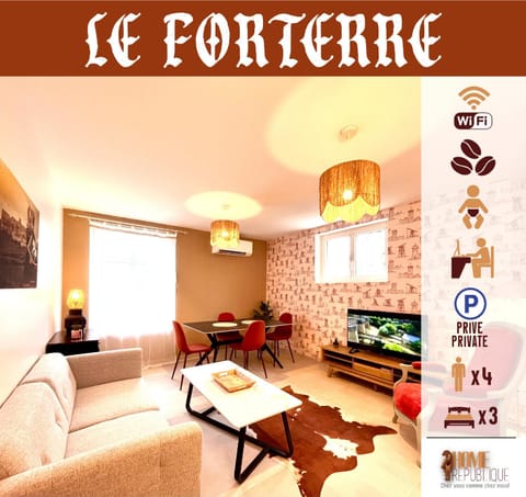 Communal lounge/ TV room, Property logo or sign, TV and multimedia, Living room, Seating area, Logo/Certificate/Sign, Text overlay