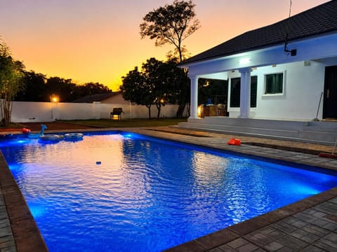 Property building, Pool view, Swimming pool, Sunset