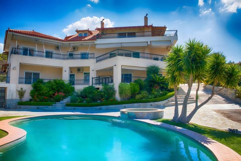 Property building, Living room, Swimming pool