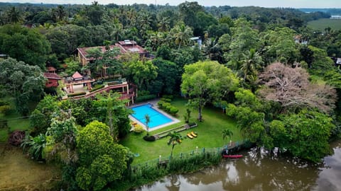 Property building, Spring, Natural landscape, Bird's eye view, Garden, Pool view, River view, Swimming pool