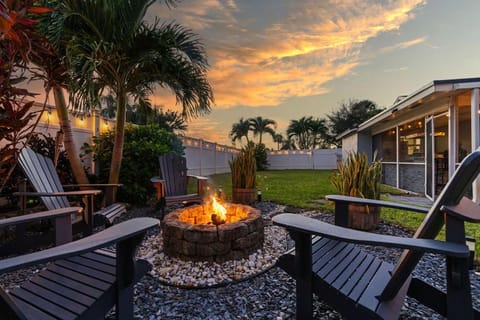 Heated PoolFire PitOutdoor KitchenCorn Hole House in Palm Beach Gardens