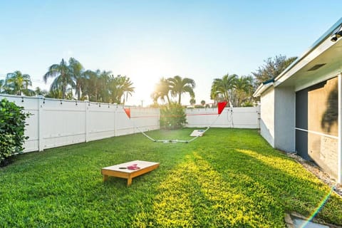 Heated PoolFire PitOutdoor KitchenCorn Hole House in Palm Beach Gardens