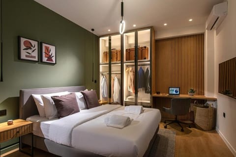 Bed, TV and multimedia, Bedroom, towels, wardrobe, air conditioner