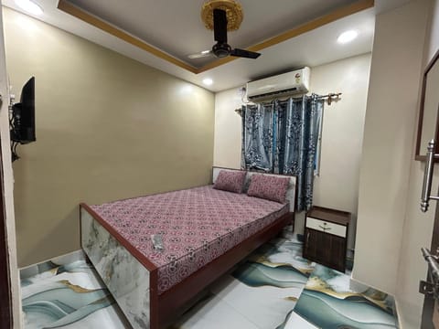 Bed, air conditioner