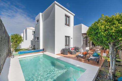 Property building, Living room, Swimming pool