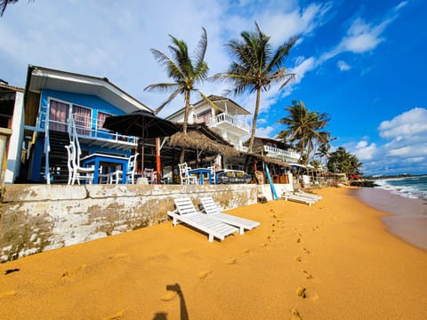 Property building, Natural landscape, Beach, Sea view, sunbed