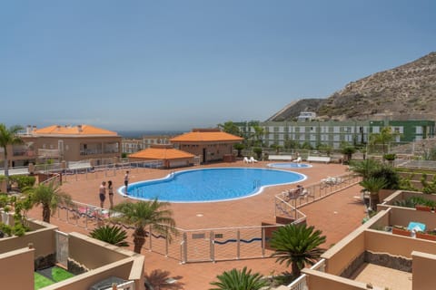 Property building, Living room, Swimming pool