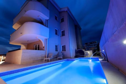 Property building, Night, Pool view, Swimming pool, Swimming pool
