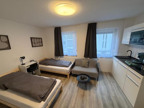 Bed, TV and multimedia, Kitchen or kitchenette, Living room, Photo of the whole room, Seating area, Bedroom, stove
