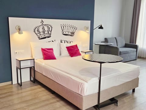 Bed, Seating area, Bedroom