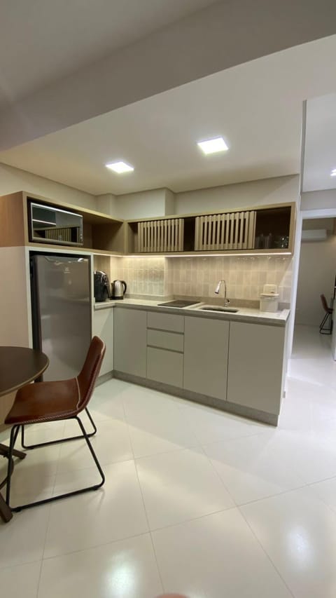 Kitchen or kitchenette, oven, stove