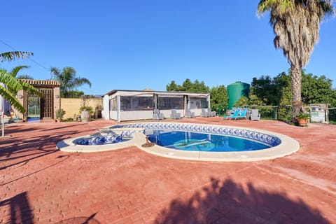 Property building, Living room, Swimming pool