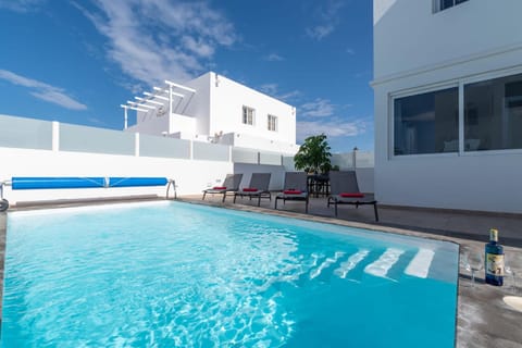 Property building, Living room, Swimming pool