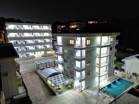 Property building, Patio, Night, View (from property/room), Balcony/Terrace, Balcony/Terrace, Pool view, Swimming pool, Swimming pool