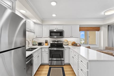 View (from property/room), Dining area, dishwasher, microwave, stove, toaster, kitchen