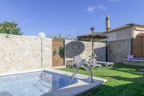 Property building, Living room, Swimming pool
