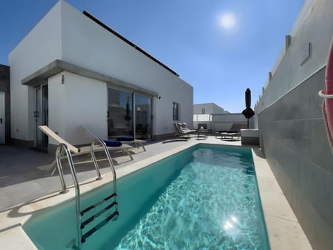 Property building, Living room, Swimming pool