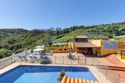 Property building, Living room, Swimming pool