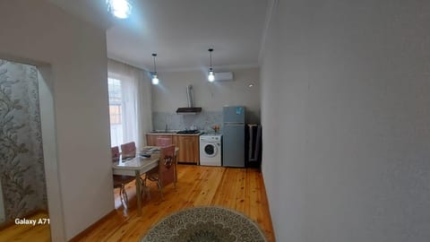 Kitchen or kitchenette, Dining area, dishwasher, stove, washing machine