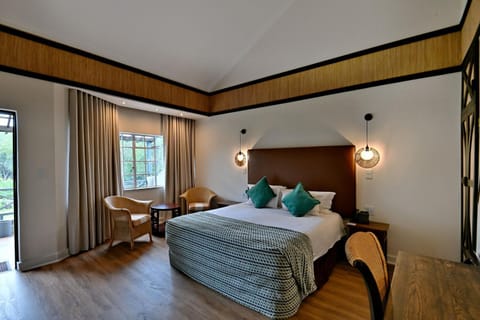 Bed, Seating area, Bedroom