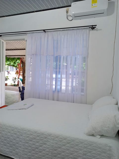 Photo of the whole room, air conditioner