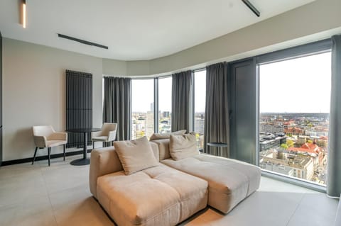 View (from property/room), Living room, Photo of the whole room, Seating area, Bedroom, City view