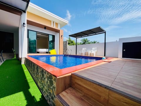 Swimming pool, sunbed