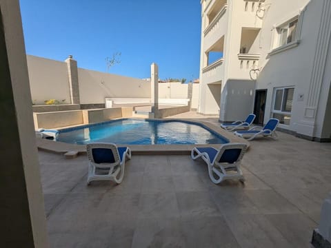 View (from property/room), Pool view, Swimming pool, sunbed