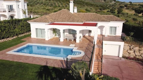 Property building, Natural landscape, Pool view, Swimming pool, sunbed