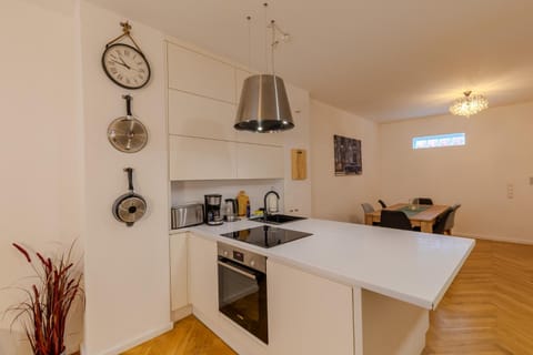 Kitchen or kitchenette, dishwasher, stove, toaster